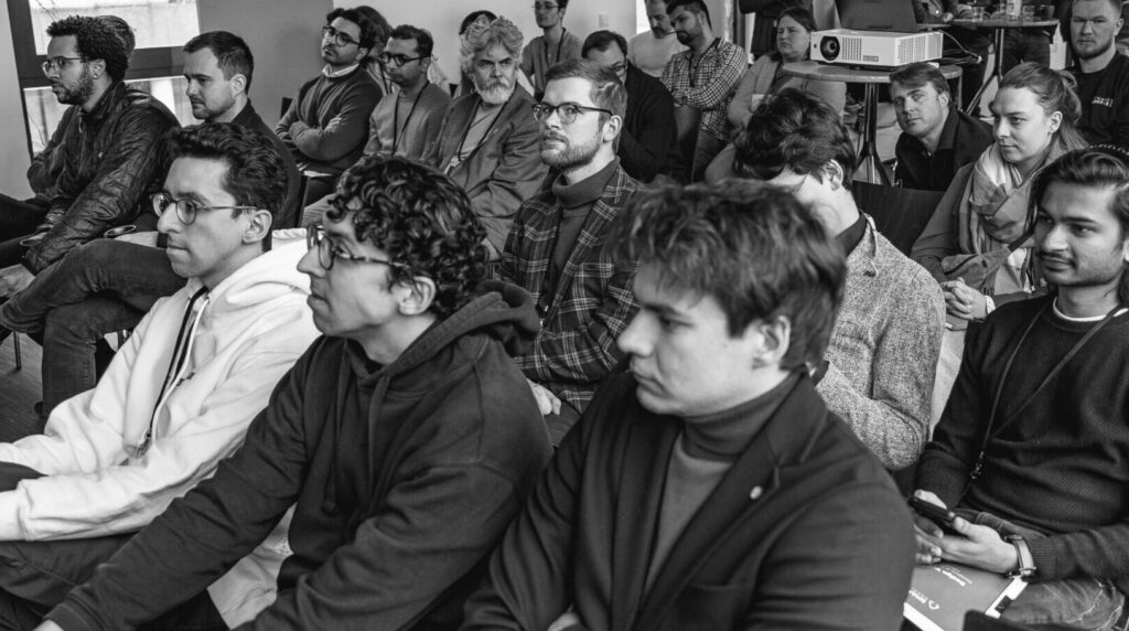 Audience members following a SynBioReactor Summit talk